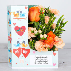 Mr & Mrs' Flowercard with Downtown Roses, Peach Spray Carnations, Hypericum Berries, Platyspermum and Fresh Eucalyptus